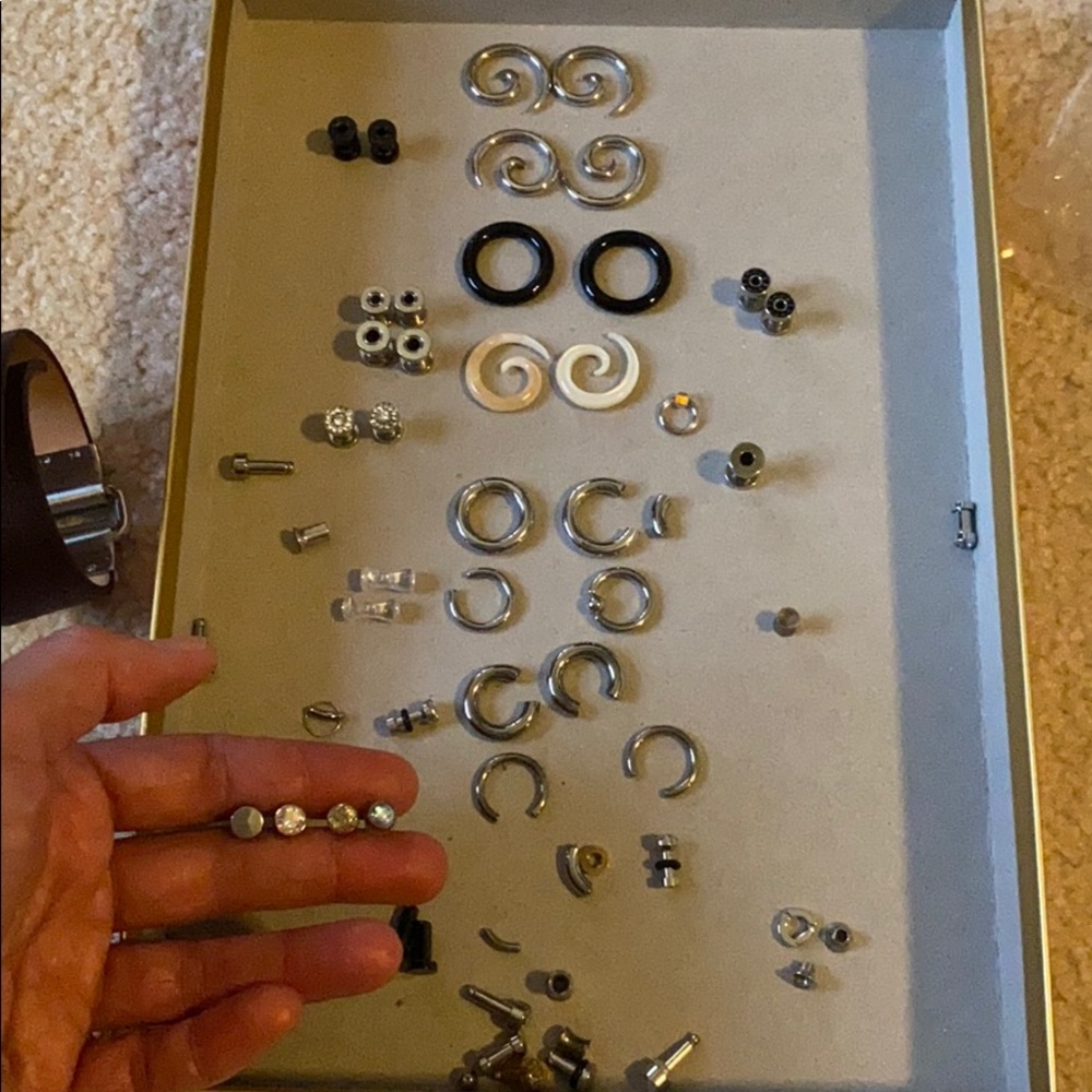 Gently used various 4-8 gauge earrings assortment